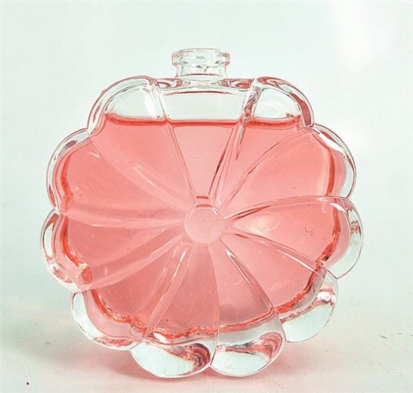 Botella de perfume de cristal con forma de flor